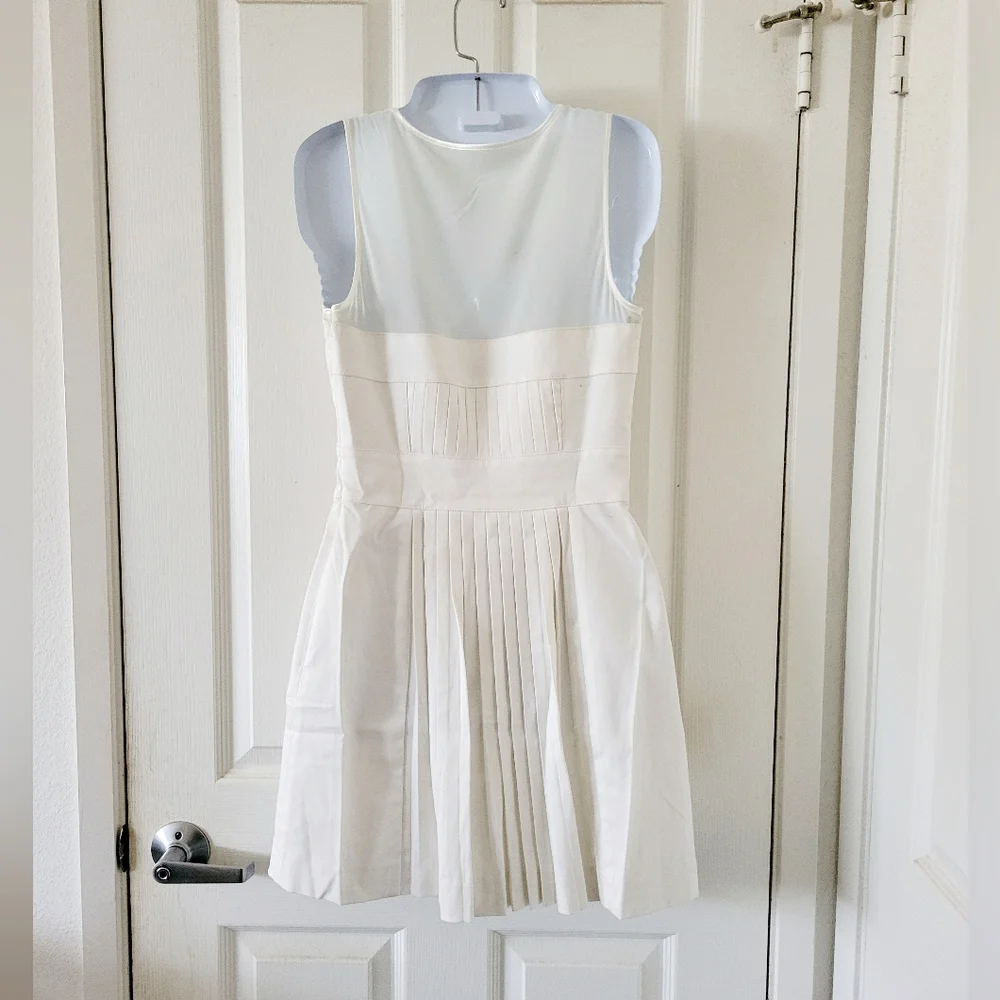 Bebe | Cute Ivory Pleated Sleeveless Fit & Flare Cocktail Dress - Picture 4 of 15